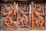 Bas relief sculptures at a temple in Puthia, Bangladesh